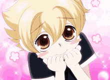a little girl with big brown eyes is making a funny face