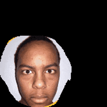 a pixelated image of a man 's face with a circle around it
