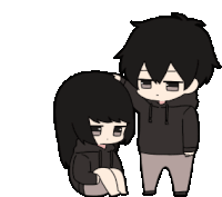 a boy putting his hand on a girl 's head .