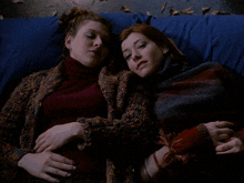 two women laying next to each other with the words teach me written on the bottom