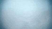 a close up of a light coming out of a blue object .