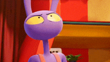a close up of a purple cartoon character with yellow eyes making a funny face .