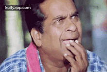 confused thinking doubt rubbing head brahmanandam