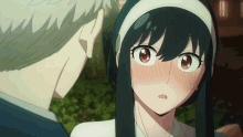 a man and a woman are looking at each other and the woman has her mouth open