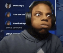 a person wearing headphones with the name dumkozy on the screen