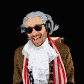 a man in a wig and sunglasses is wearing an american flag scarf