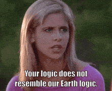 a woman in a purple shirt says your logic does not resemble our earth logic