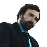a man in a suit and tie has a lanyard around his neck that says ' state police ' on it