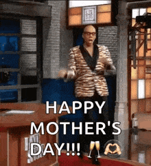 a man in a tiger print suit is dancing on a red carpet and says happy mother 's day !!!