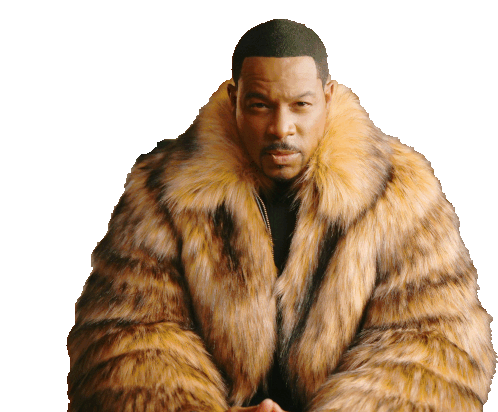 a man wearing a fur coat with a black shirt underneath it