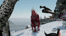 a red dinosaur is standing on a snowy hill