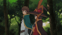 a girl in a witch hat holds a cane