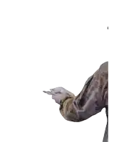 a man in a us army uniform is holding something in his hand
