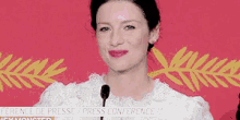 Cannes GIF - Caitriona Balfe Speech Proud GIFs
