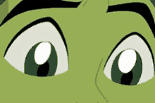 a close up of a cartoon character 's eyes with a white center
