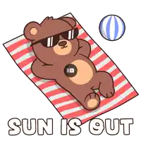 a teddy bear wearing sunglasses is laying on a striped towel with the words sun is out below him