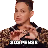 a man in a leopard print jacket is making a funny face and the word suspense is behind him