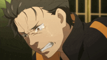 a close up of a man with a tear running down his face
