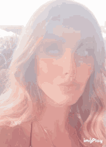 a woman with axp written on her face