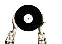a person in a plaid shirt is holding a record with a white label