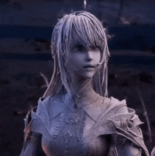 a close up of a statue of a woman with white hair .