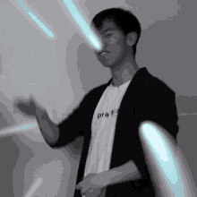 a man wearing a white shirt that says pra is dancing