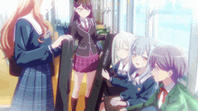 a group of anime girls are on a bus and one of them is holding a guitar case that says matsuoka