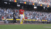 a baseball player wearing a jersey that says braves