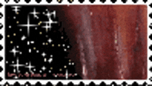 a stamp with a picture of a red background and stars