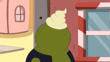 a green cartoon character with whipped cream on top of his head