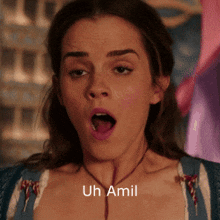 a close up of a woman 's face with the words uh a mil above her