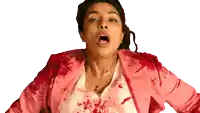 a woman in a pink jacket with blood on her clothes