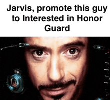 a close up of a man 's face with the words jarvis promote this guy to interested in honor guard