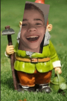 a gnome with a picture of a young boy on it
