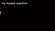 a woman in a tuxedo is making a funny face with the words my honest reaction behind her