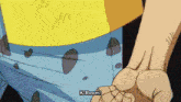 a close up of a person 's fist with k-room written on it