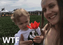 Wtf Kids GIF - Wtf Kids Smell Flower GIFs