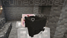 a black block with a heart on it