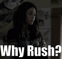 a woman in a dark room with the words " why rush " above her
