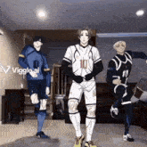 a group of soccer players are dancing in a living room and one of them has the number 10 on his jersey