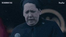 a hulu ad for the handmaid 's tale shows a woman crying