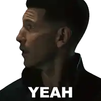 a close up of a man 's face with the word yeah written below it
