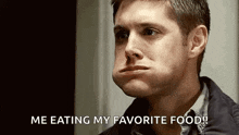 a man is making a funny face and saying `` me eating my favorite food ! ''