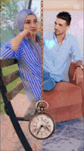 a man and a woman are sitting next to each other with a pocket watch hanging from a chain between them