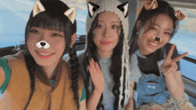 three girls are posing for a picture and one of them has a dog nose
