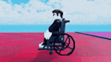 a person is sitting in a wheelchair on a red floor .