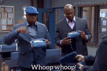 a man in a suit says whoop whoop in a classroom