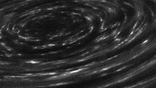 a black and white image of a swirl of lines