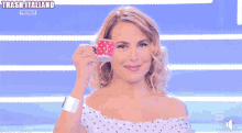a woman is holding a cup with trash italiano promo written on the bottom