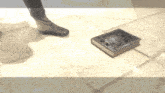 a person standing next to a book that says ' x ' on the cover